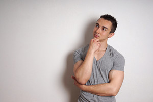 graphicstock-muscular-young-man-contemplating-an-idea-with-copy-space_SulQo3w89b_thumb